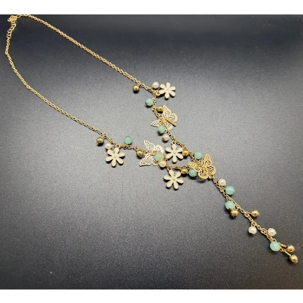 Gold Tone Floral Y-drop necklace delicate white flowers and butterfly charms